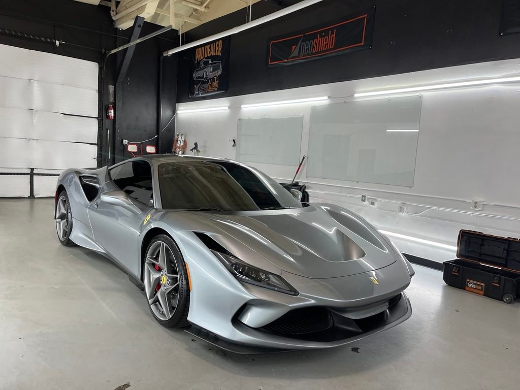 Silver Ferrari in the R U Tinted installation bay
